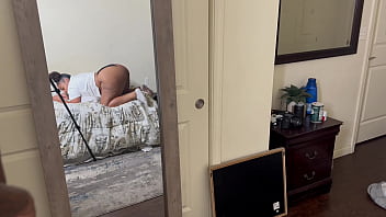 African-American woman with voluptuous buttocks enjoys anal sex while watching reflection in mirror